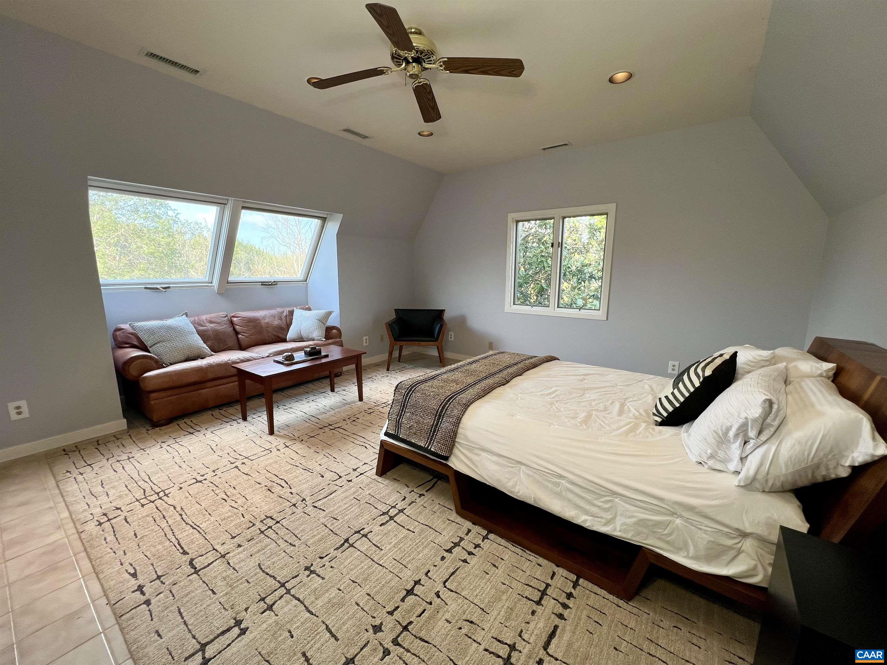 4749 Wesley Chapel Road Free Union, VA 22940 - Photo 50 of 73 a bedroom with a bed couch and window