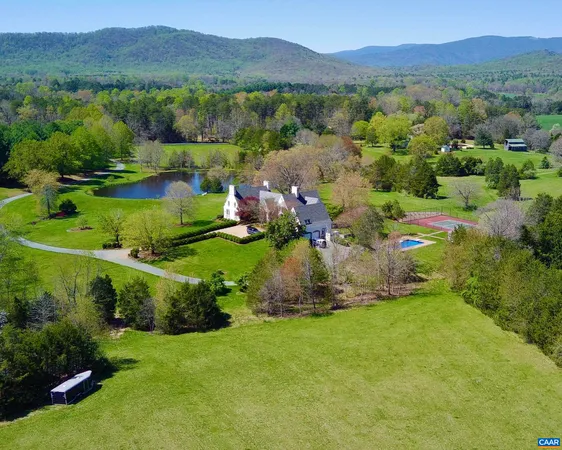 a view of swimming pool with seating space