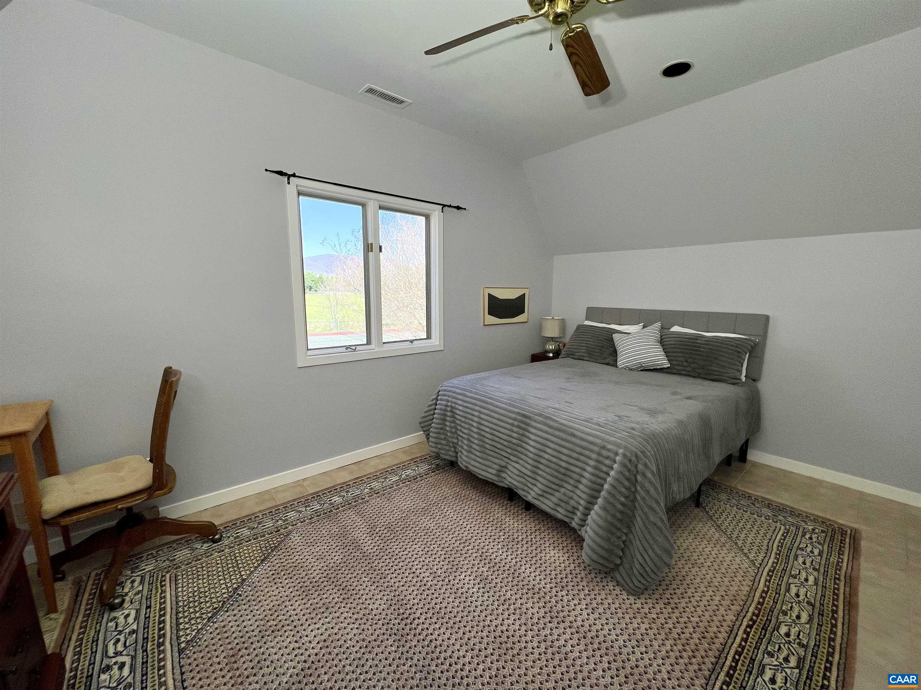 4749 Wesley Chapel Road Free Union, VA 22940 - Photo 53 of 73 a bedroom with a bed and chair