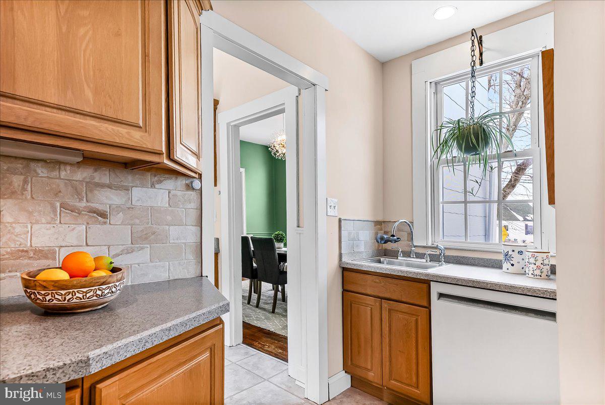 204 Rutledge Avenue Folsom, PA 19033 - Photo 15 of 37 a bathroom with a sink and a mirror