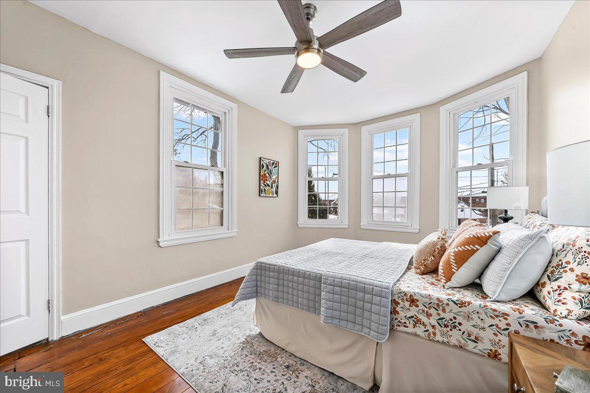 204 Rutledge Avenue Folsom, PA 19033 - Photo 20 of 37 a bedroom with a bed and wooden floor