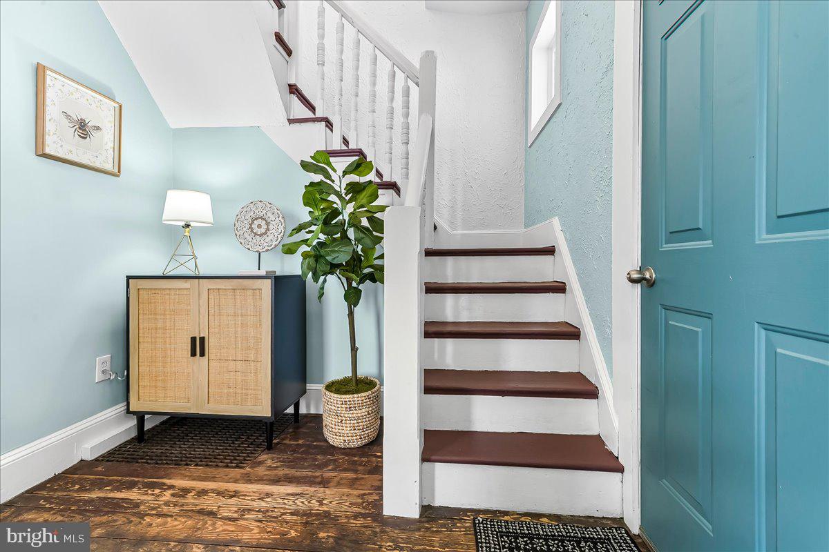 204 Rutledge Avenue Folsom, PA 19033 - Photo 5 of 37 a view of entryway with stairs and wooden floor