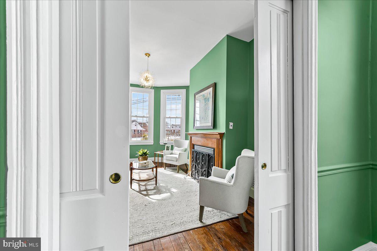204 Rutledge Avenue Folsom, PA 19033 - Photo 10 of 37 a living room with furniture and a large window