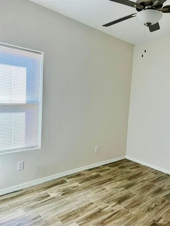 a view of a room that has a window