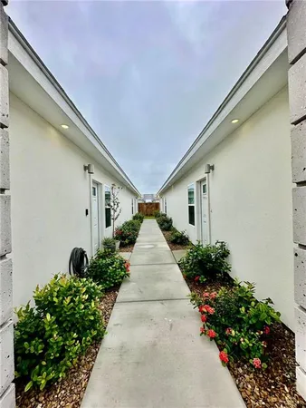 a view of a garden with pathway