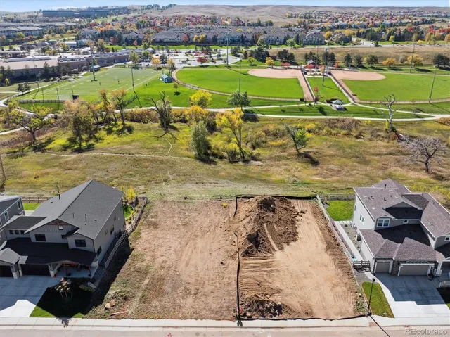 a view of a swimming pool with a lake view