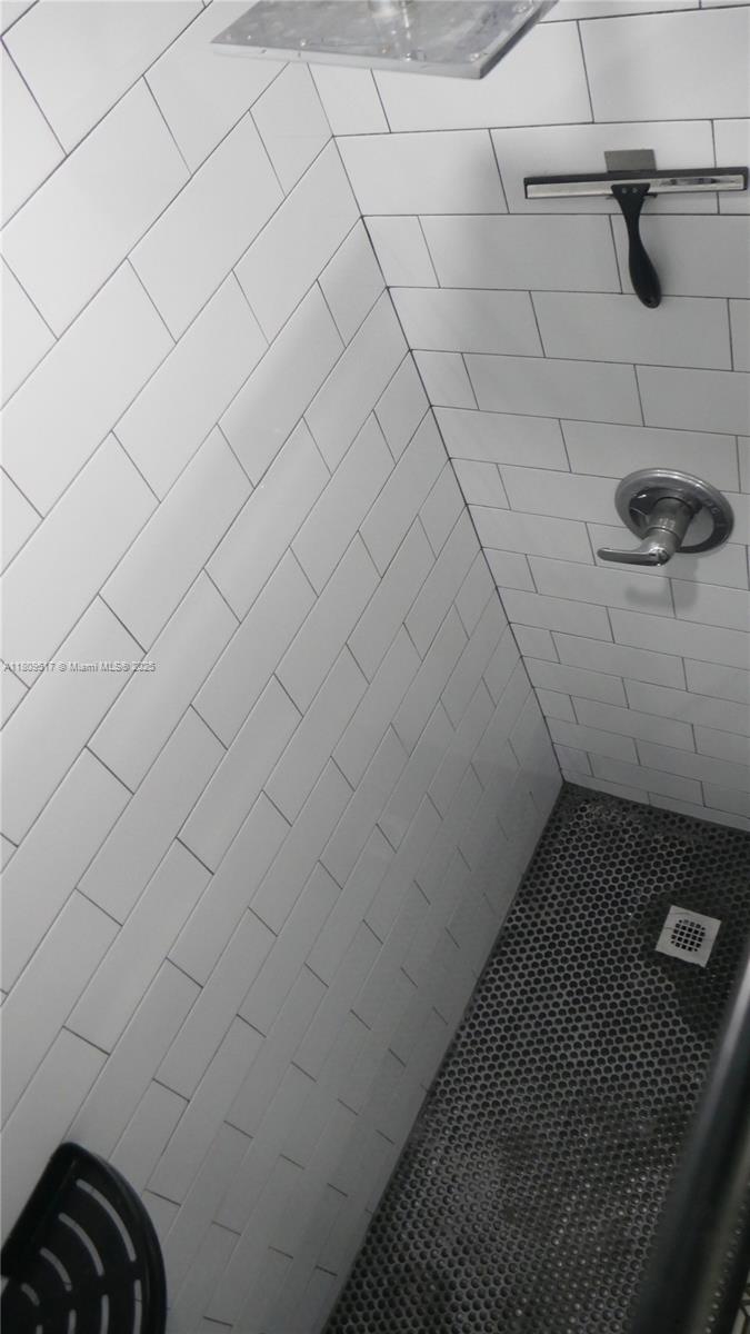 1930 Northwest 55th Street Miami, FL 33142 - Photo 13 of 30 a bathroom with a shower