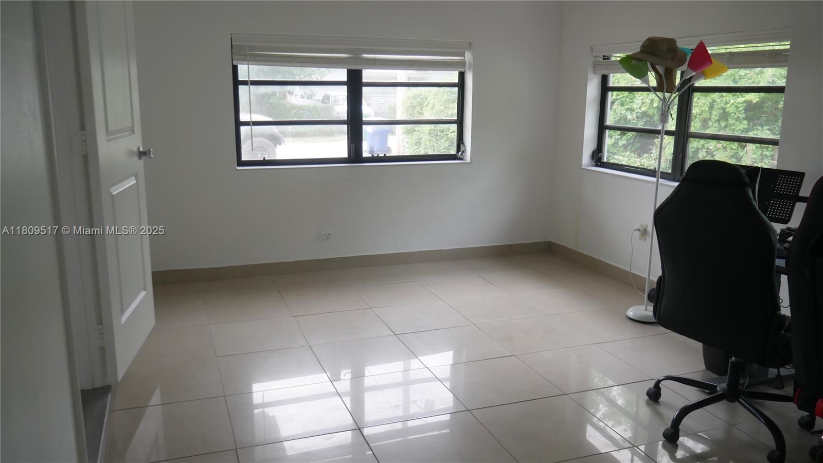 1930 Northwest 55th Street Miami, FL 33142 - Photo 7 of 30 a view of workspace with a window