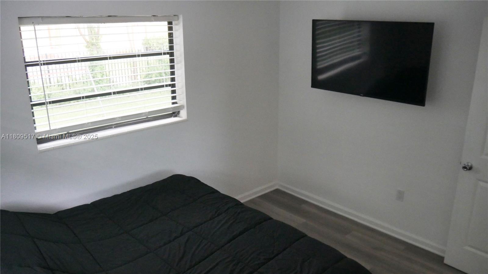 1930 Northwest 55th Street Miami, FL 33142 - Photo 9 of 30 a view of a small space with a window