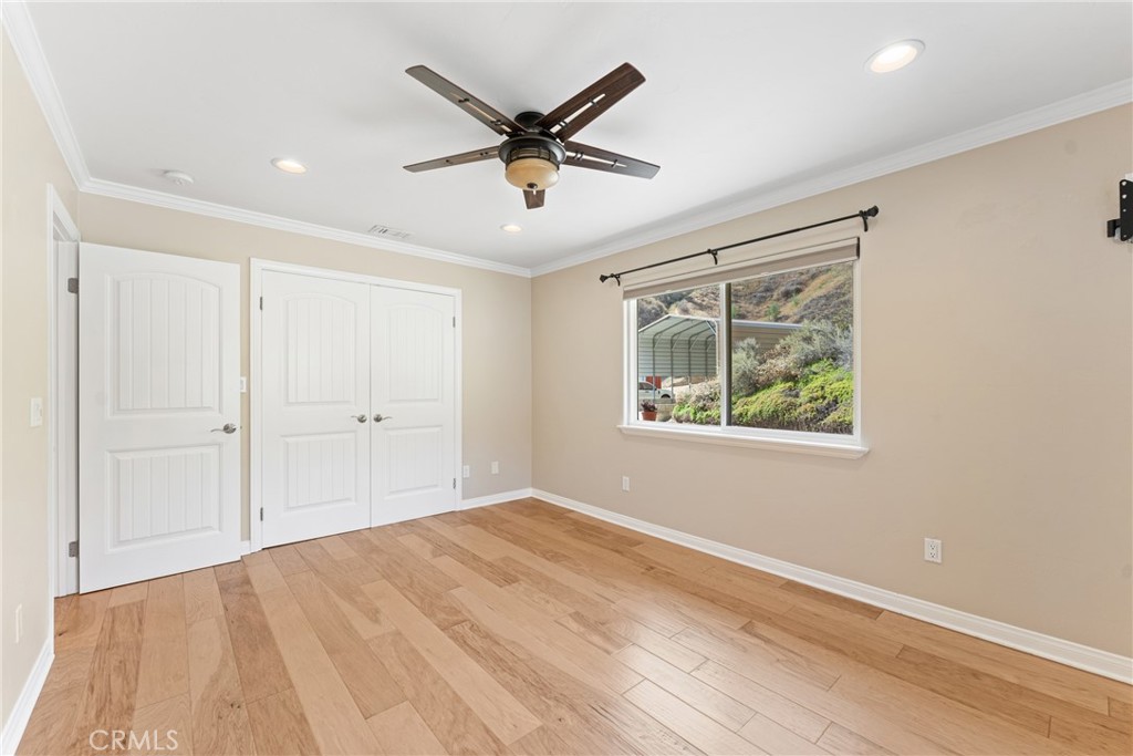 30300 Live Oak Canyon Road Redlands, CA 92373 - Photo 48 of 67 a view of a livingroom with a ceiling fan and window