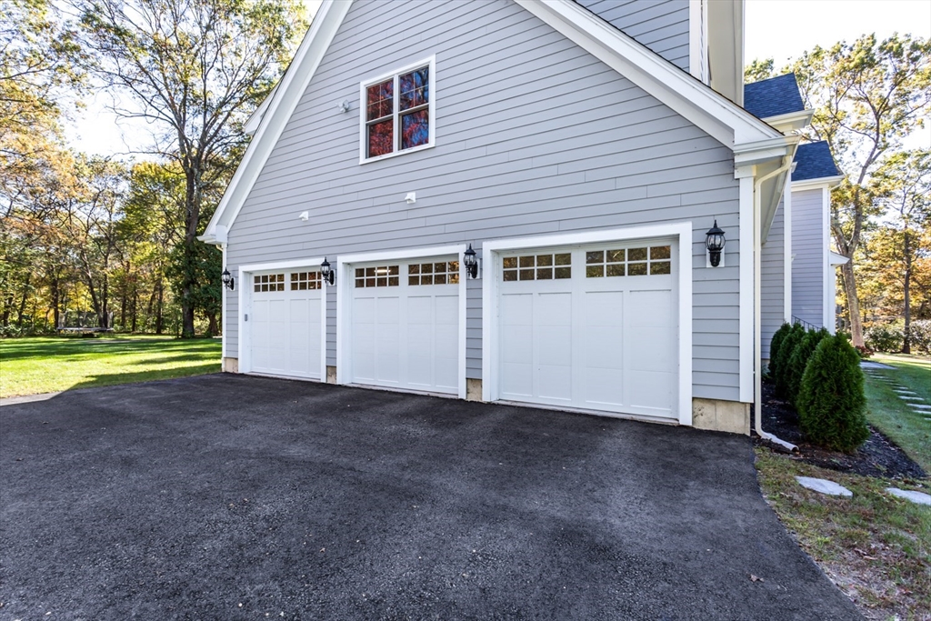 216 Oak Street Westwood, MA 02090 - Photo 2 of 37 a view of a house with a backyard