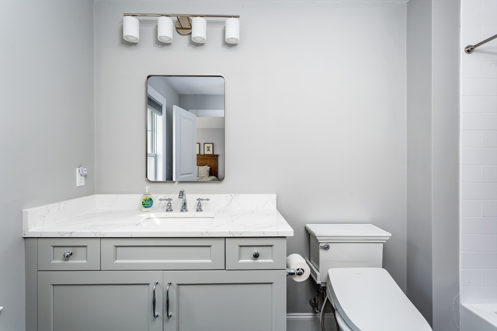 216 Oak Street Westwood, MA 02090 - Photo 26 of 37 a bathroom with a sink and a toilet