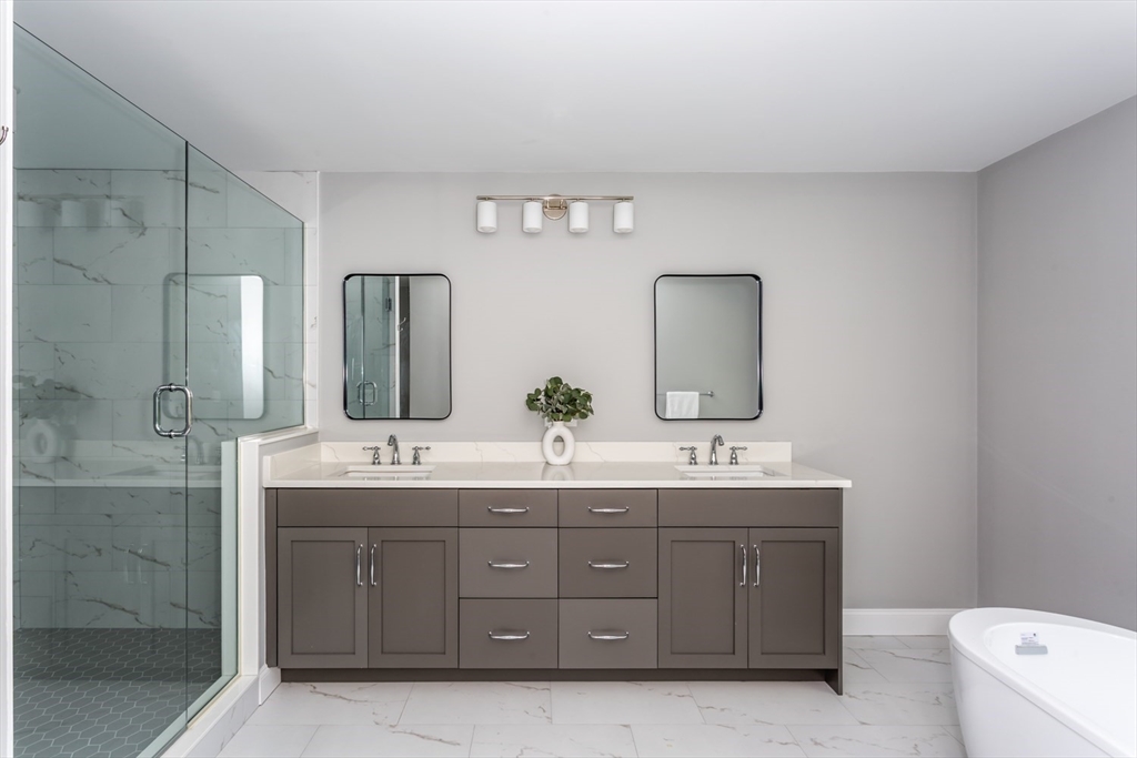216 Oak Street Westwood, MA 02090 - Photo 29 of 37 a bathroom with a double vanity sink mirror and double
