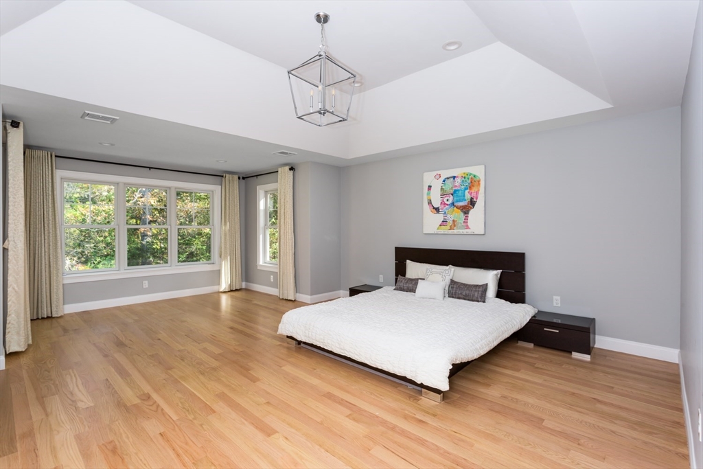 216 Oak Street Westwood, MA 02090 - Photo 31 of 37 a bedroom with a bed and window