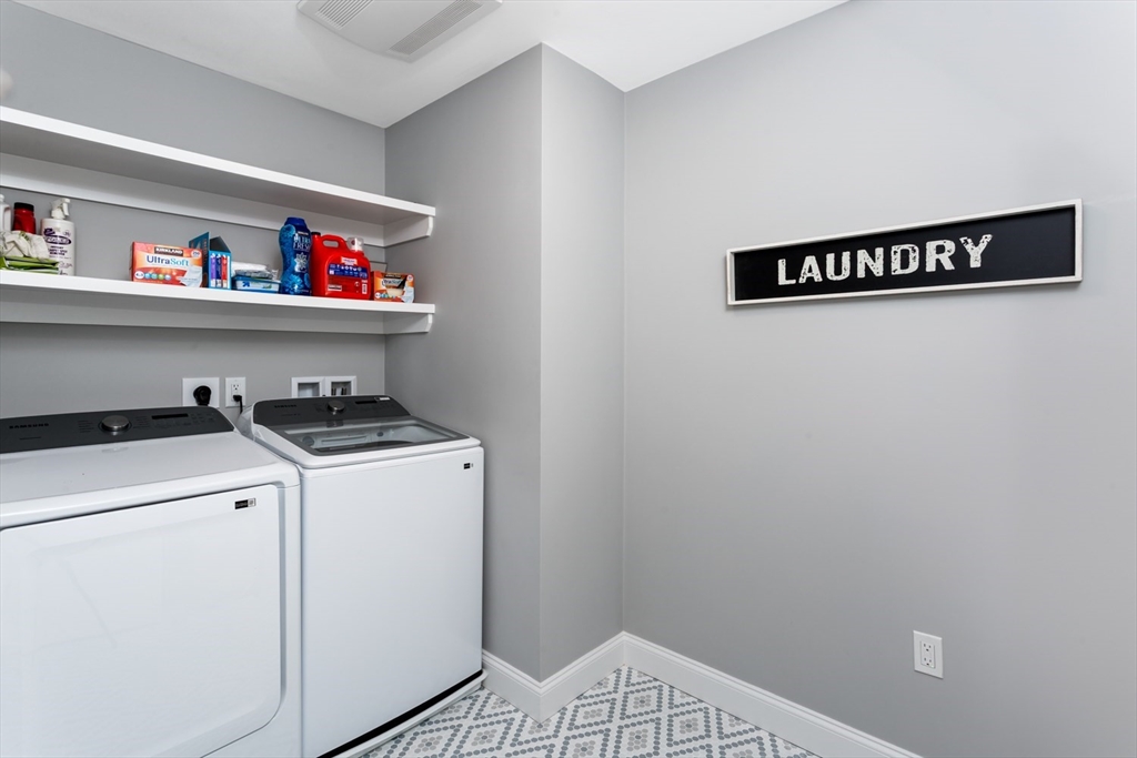 216 Oak Street Westwood, MA 02090 - Photo 33 of 37 a utility room with dryer and washer