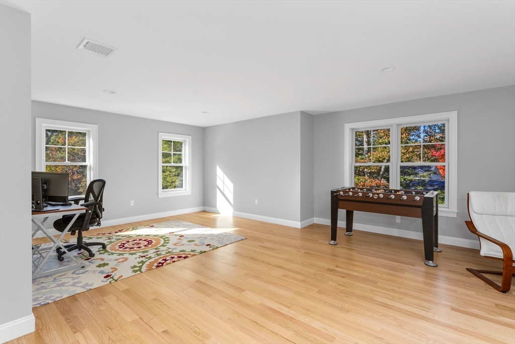 216 Oak Street Westwood, MA 02090 - Photo 36 of 37 a bedroom with furniture and a window