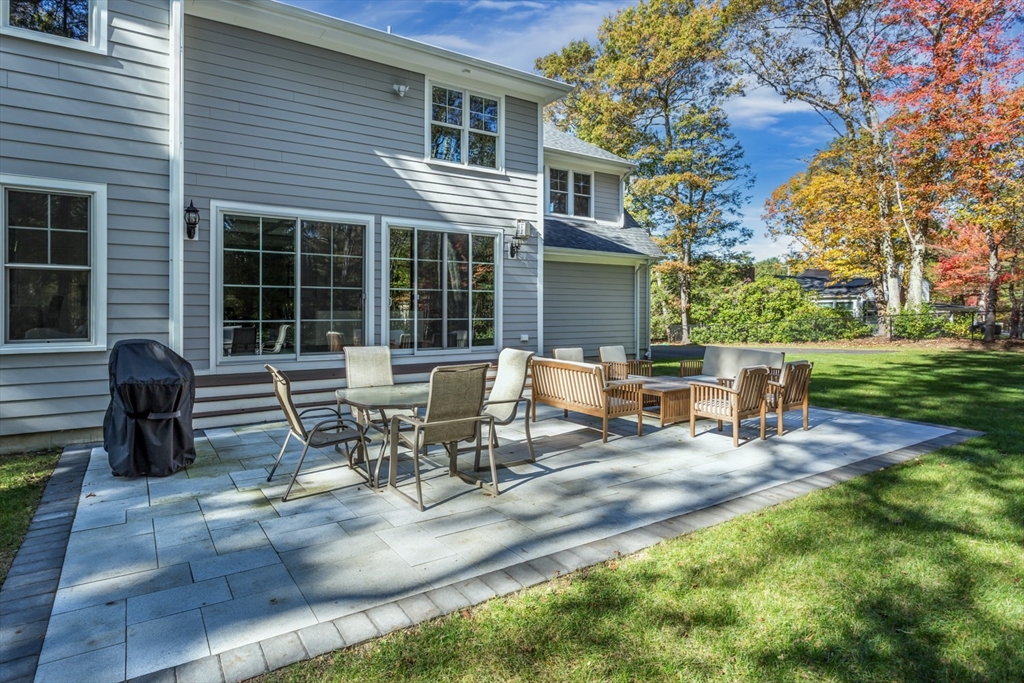 216 Oak Street Westwood, MA 02090 - Photo 5 of 37 a view of a outdoor sitting area with chairs