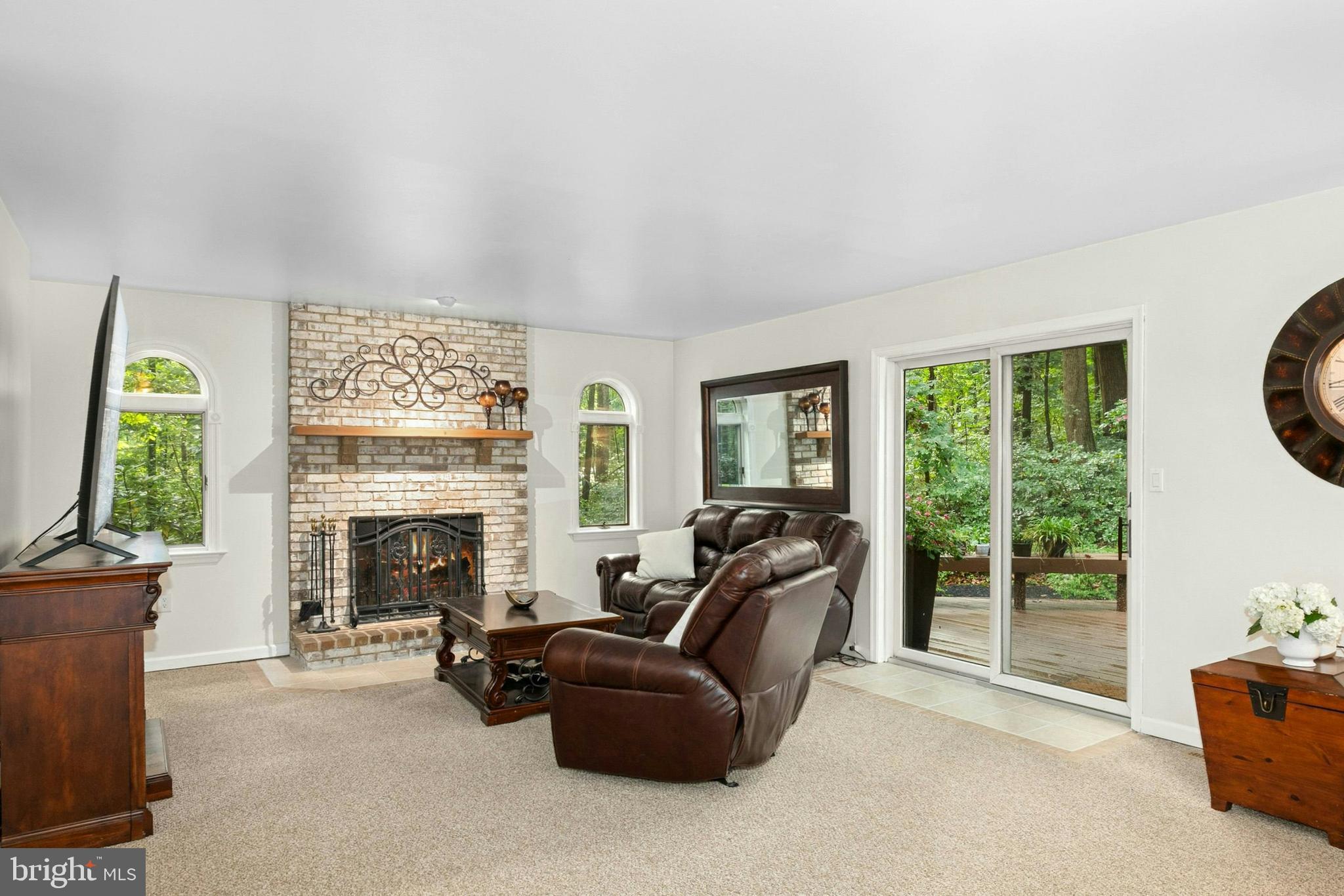 1715 Kumry Road Quakertown, PA 18951 - Photo 12 of 37 a living room with furniture and a fireplace