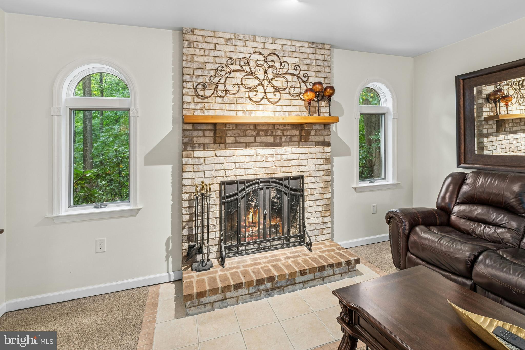 1715 Kumry Road Quakertown, PA 18951 - Photo 14 of 37 a living room with furniture and a fireplace