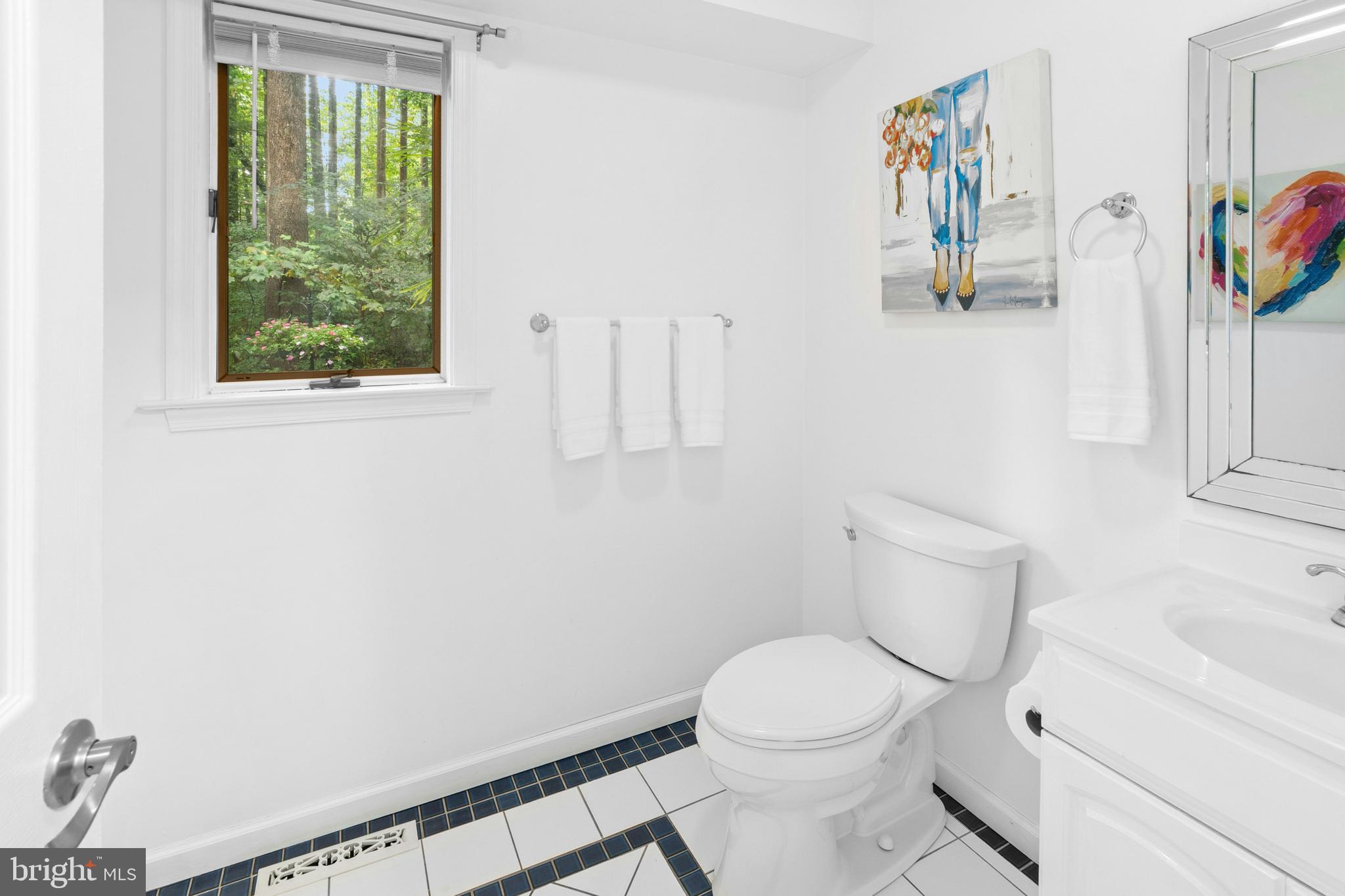 1715 Kumry Road Quakertown, PA 18951 - Photo 18 of 37 a white toilet sitting next to a bathroom sink
