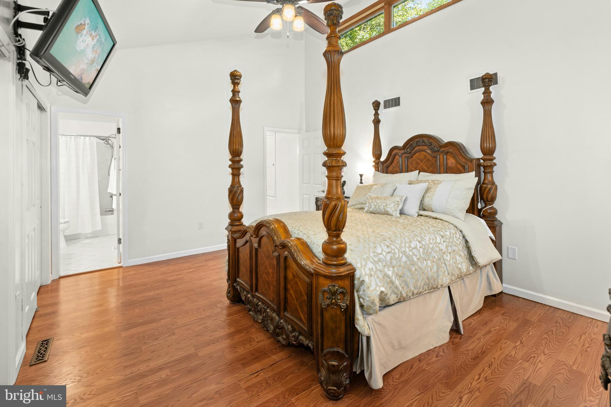 1715 Kumry Road Quakertown, PA 18951 - Photo 21 of 37 a bedroom with a bed and wooden floor