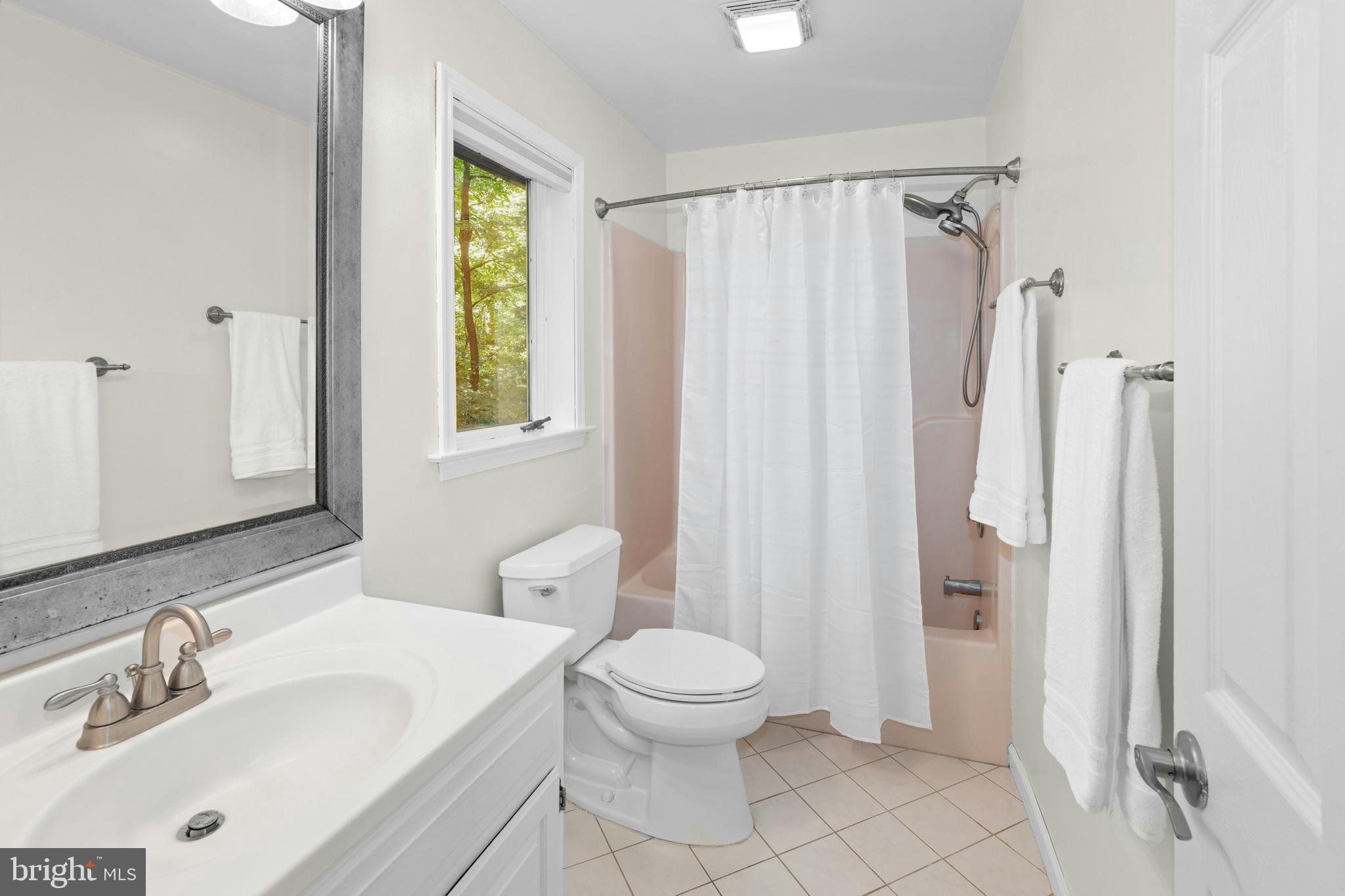1715 Kumry Road Quakertown, PA 18951 - Photo 23 of 37 a bathroom with a sink toilet and shower