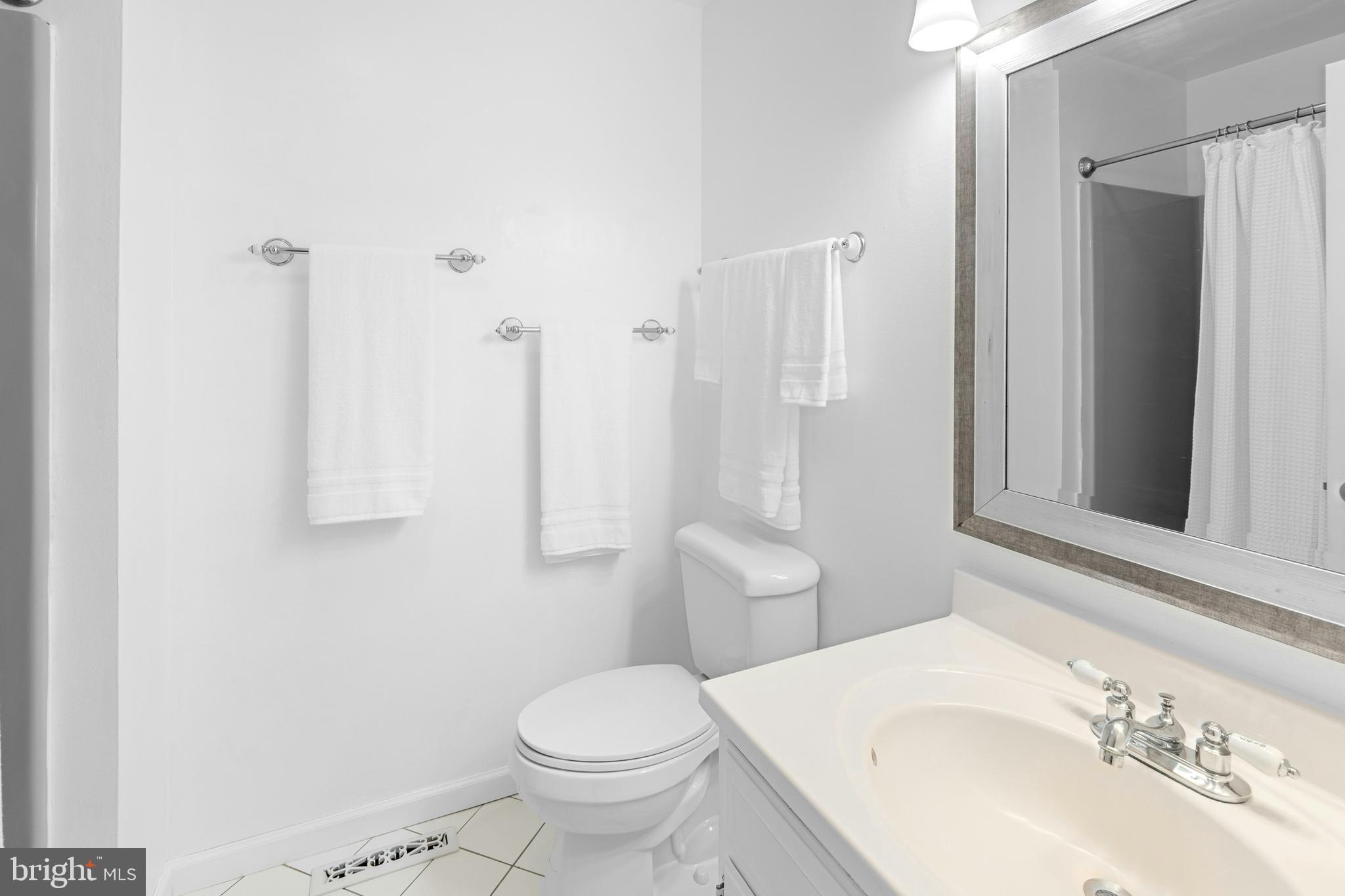 1715 Kumry Road Quakertown, PA 18951 - Photo 25 of 37 a bathroom with a sink toilet and shower