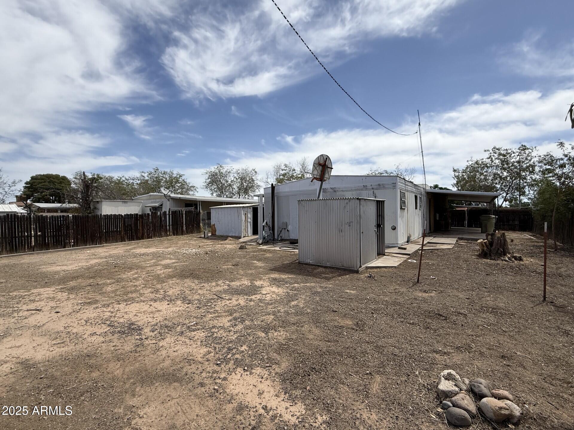 7122 North 68th Drive Glendale, AZ 85303 - Photo 6 of 6 a view of a backyard with furniture