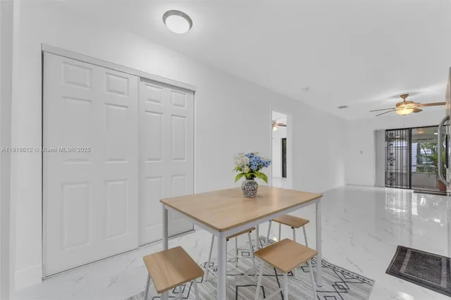 a view of dining room and wooden floor