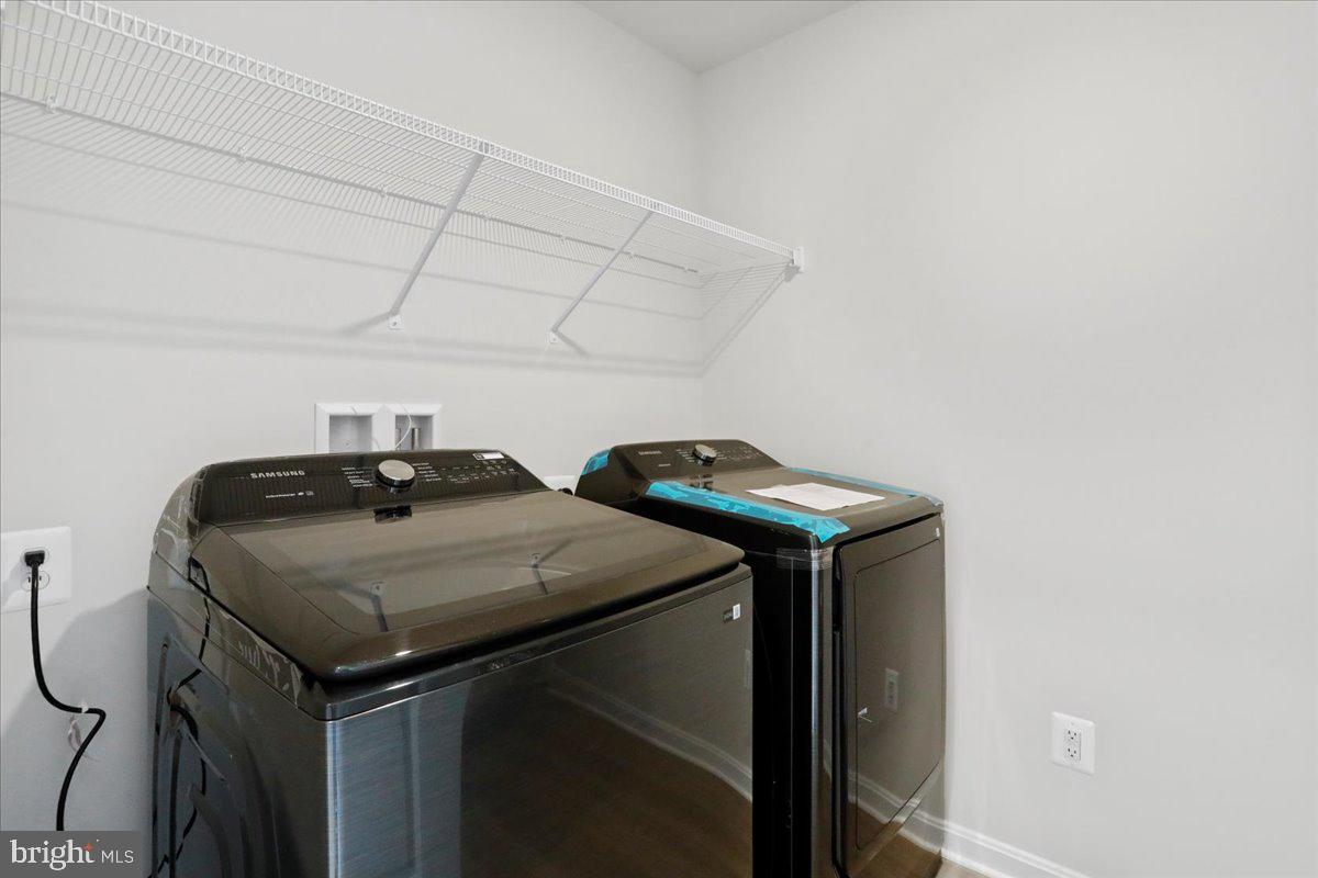 62 Peters Avenue Ranson, WV 25438 - Photo 12 of 31 a utility room with dryer and washer