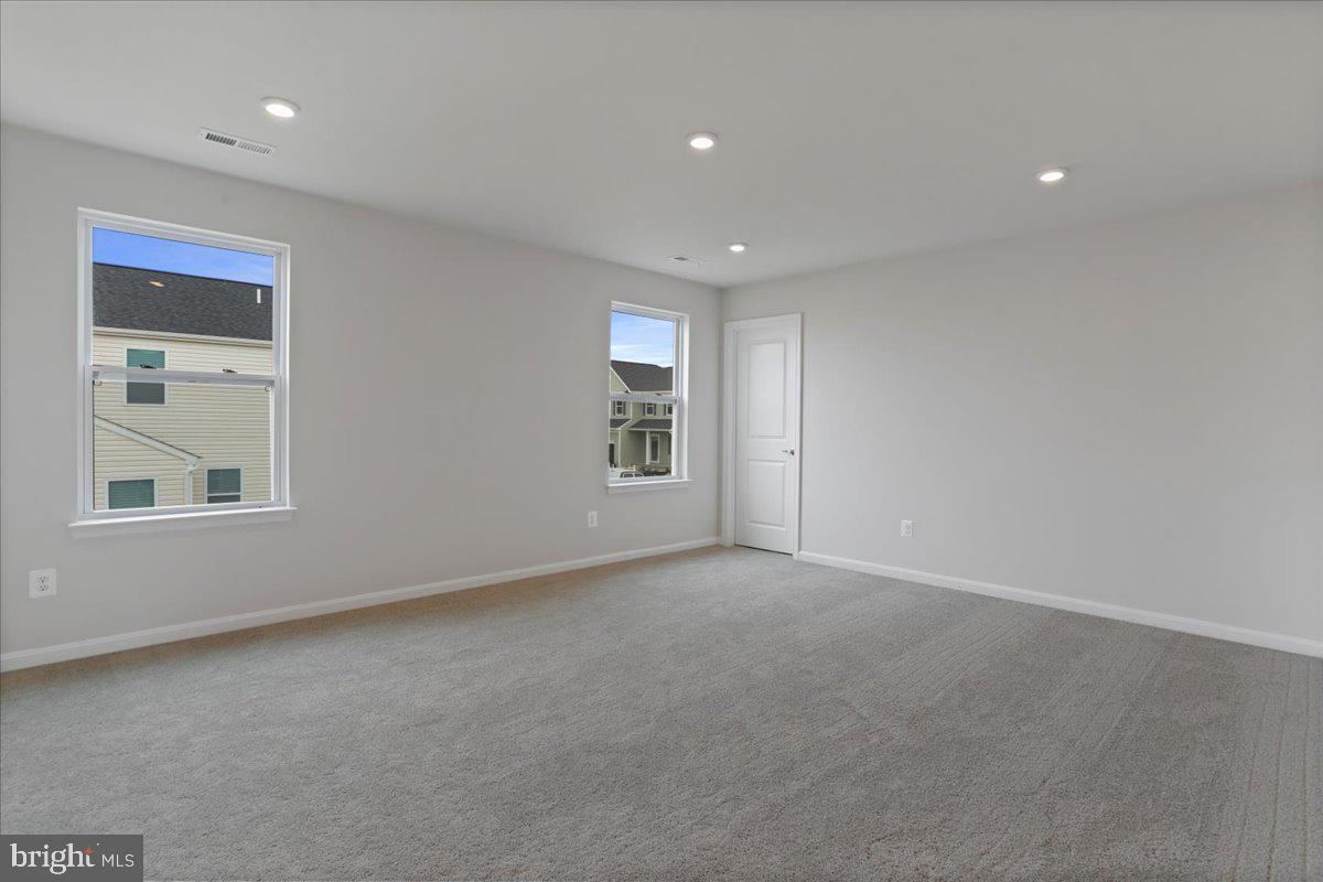 62 Peters Avenue Ranson, WV 25438 - Photo 18 of 31 a view of an empty room with a window