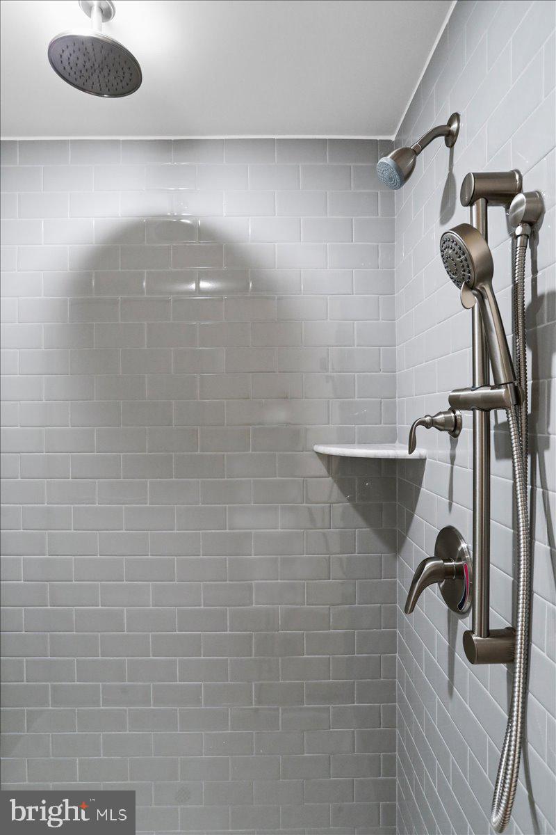 62 Peters Avenue Ranson, WV 25438 - Photo 23 of 31 a bathroom with a shower