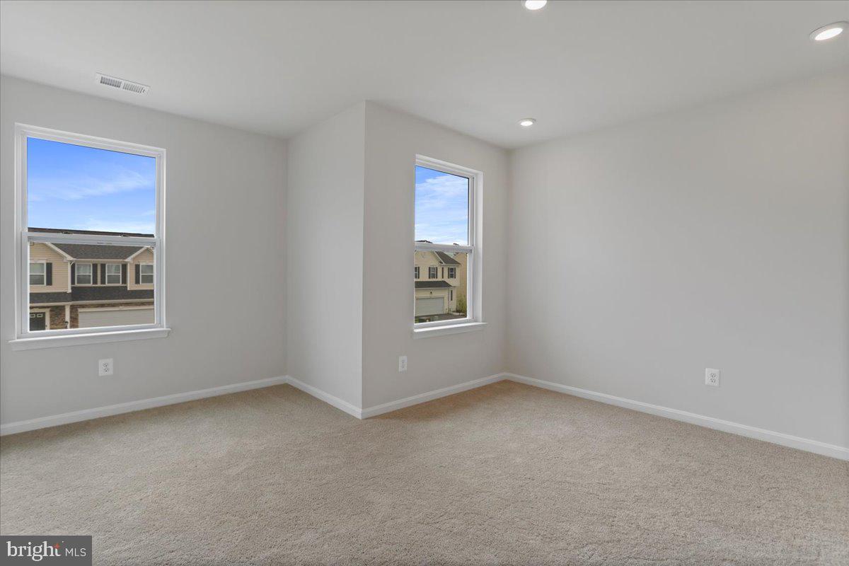 62 Peters Avenue Ranson, WV 25438 - Photo 25 of 31 a view of an empty room with a window