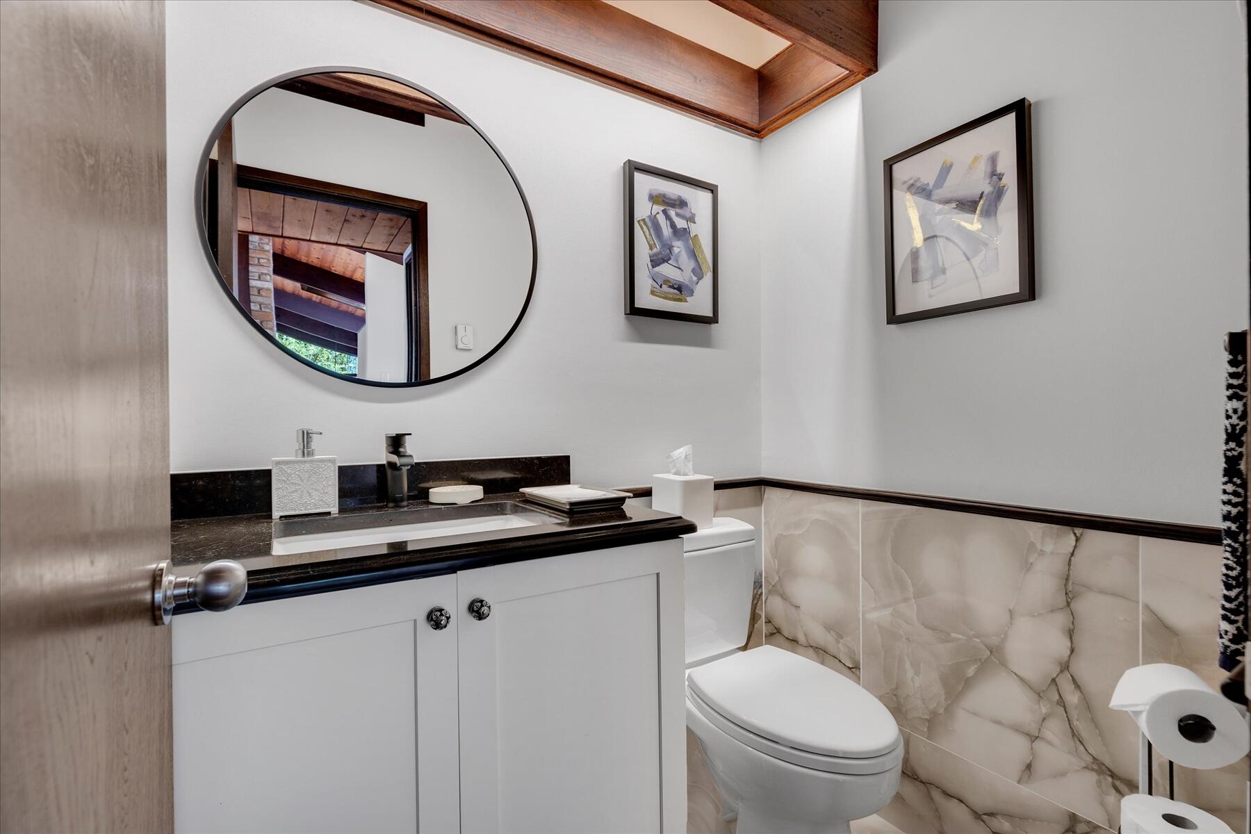 80 Woodlot Road Wellfleet, MA 02667 - Photo 23 of 67 a bathroom with a toilet a sink and mirror
