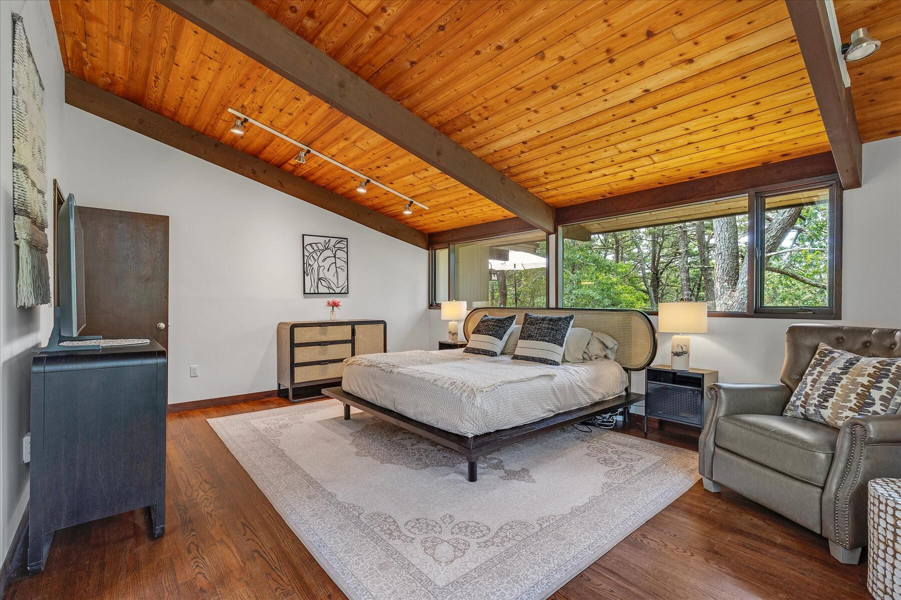 80 Woodlot Road Wellfleet, MA 02667 - Photo 24 of 67 a living room with furniture and a large window