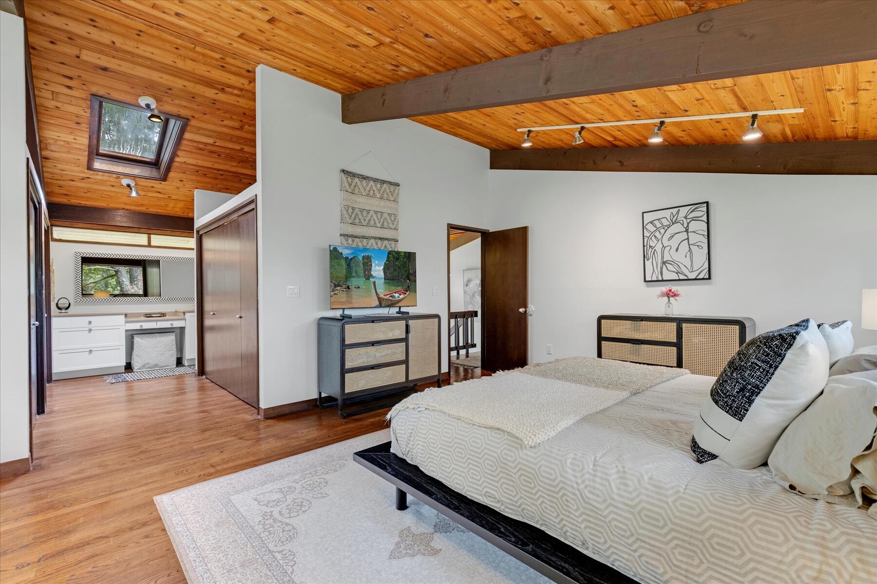 80 Woodlot Road Wellfleet, MA 02667 - Photo 25 of 67 a bedroom with a large bed and a view of kitchen