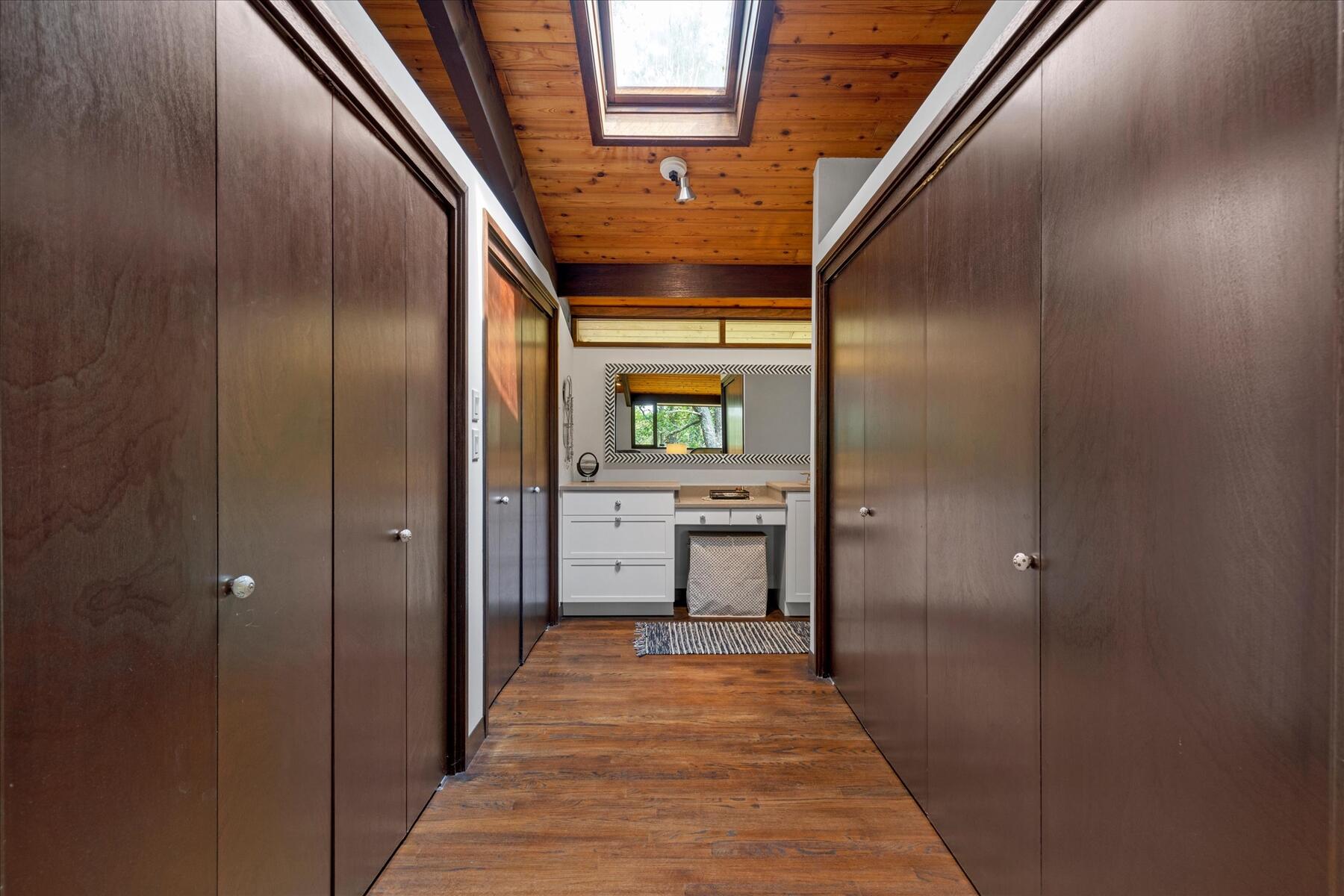 80 Woodlot Road Wellfleet, MA 02667 - Photo 27 of 67 a view of a hallway with wooden floor and staircase