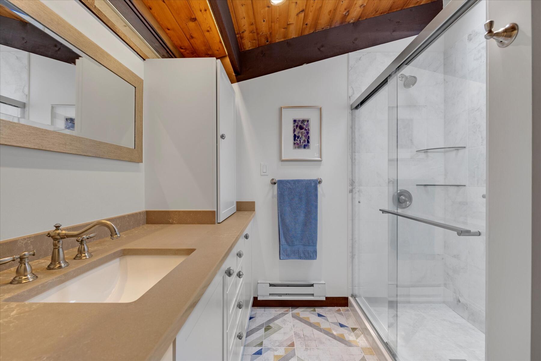 80 Woodlot Road Wellfleet, MA 02667 - Photo 29 of 67 a bathroom with a sink and mirror