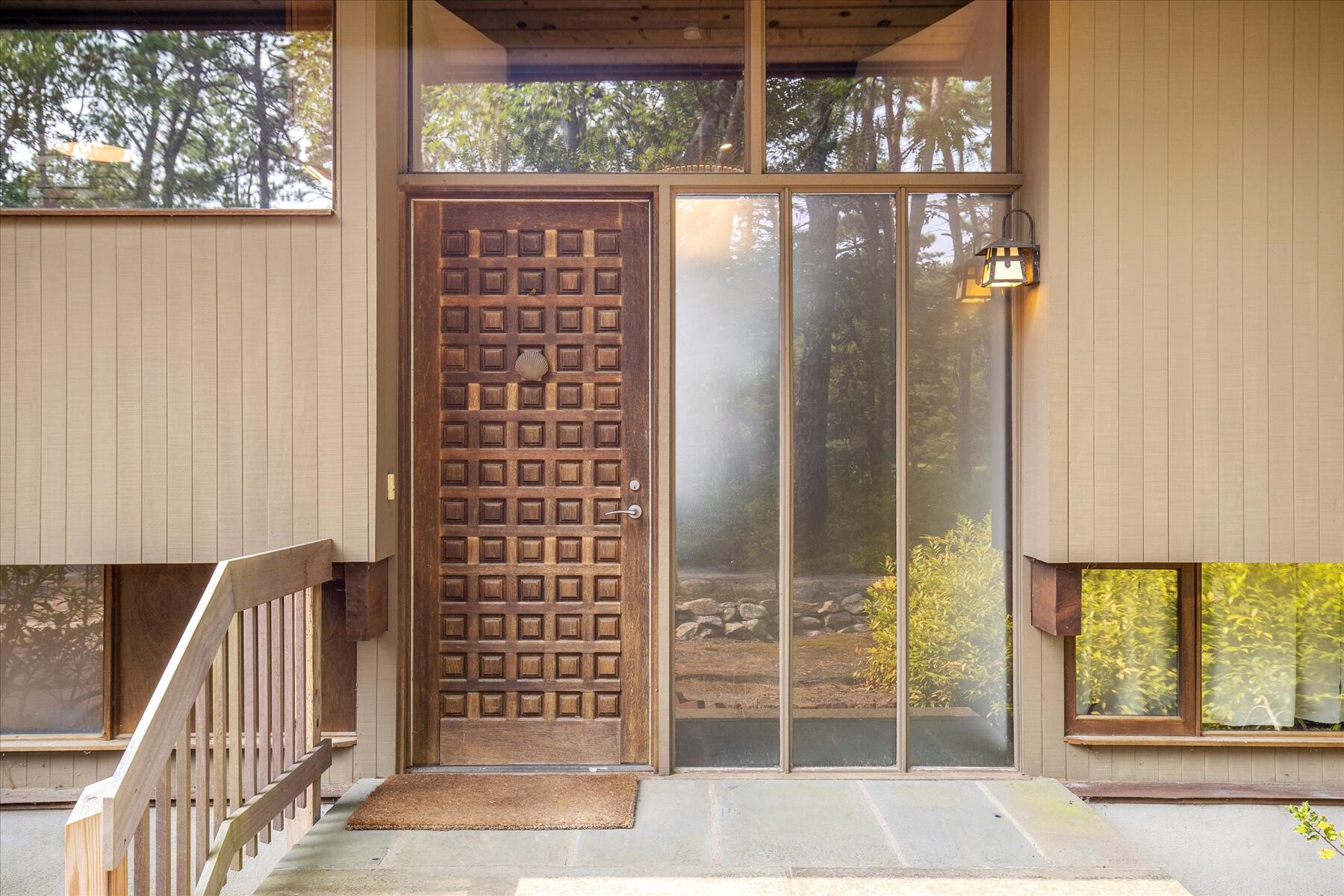 80 Woodlot Road Wellfleet, MA 02667 - Photo 3 of 67 a view of a glass door with glass door
