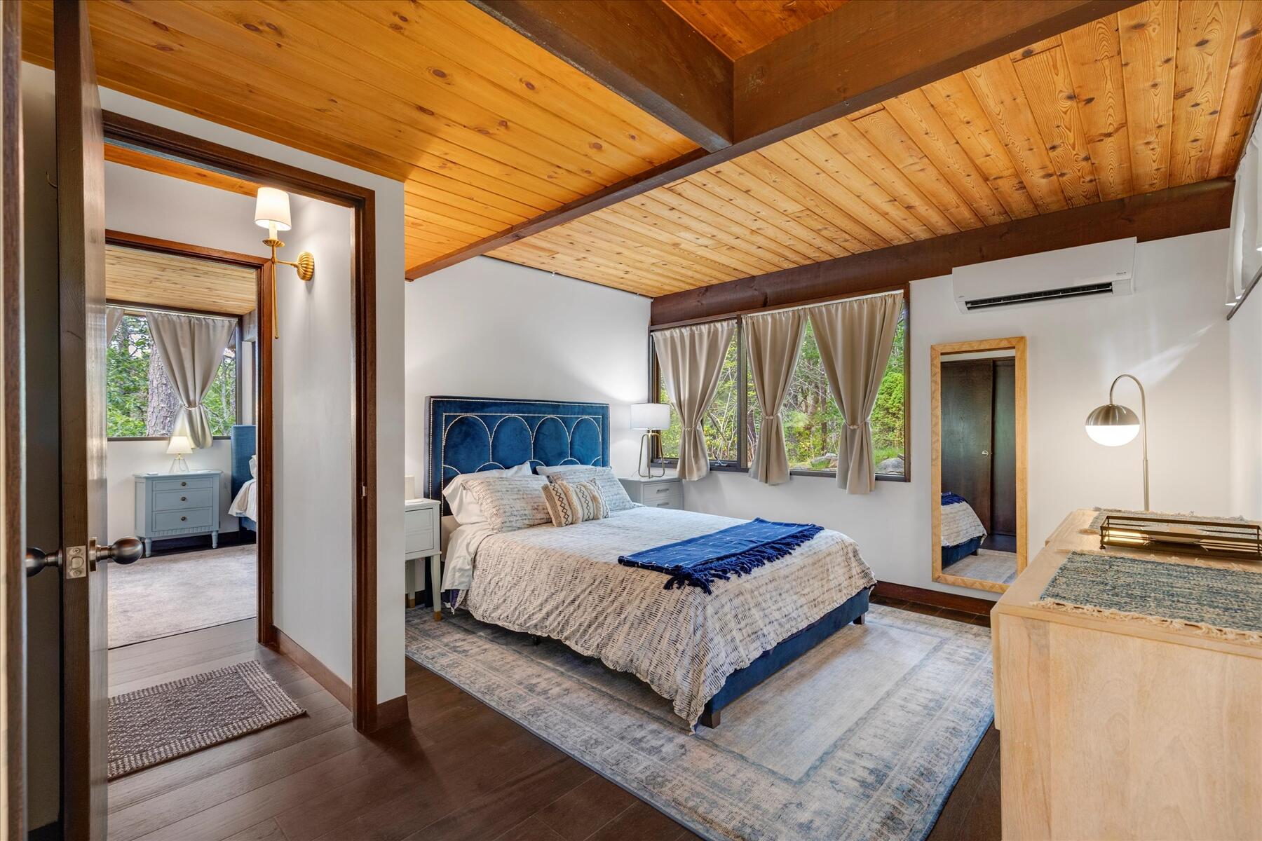 80 Woodlot Road Wellfleet, MA 02667 - Photo 31 of 67 a spacious bedroom with a large bed and a dresser