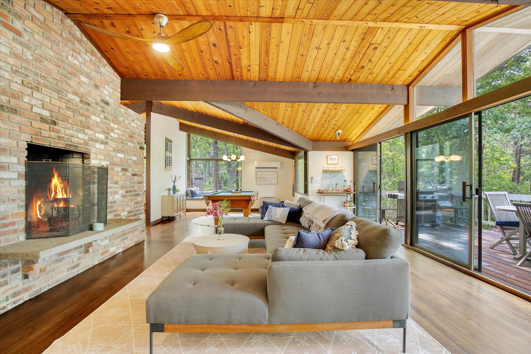 80 Woodlot Road Wellfleet, MA 02667 - Photo 7 of 67 a living room with large windows