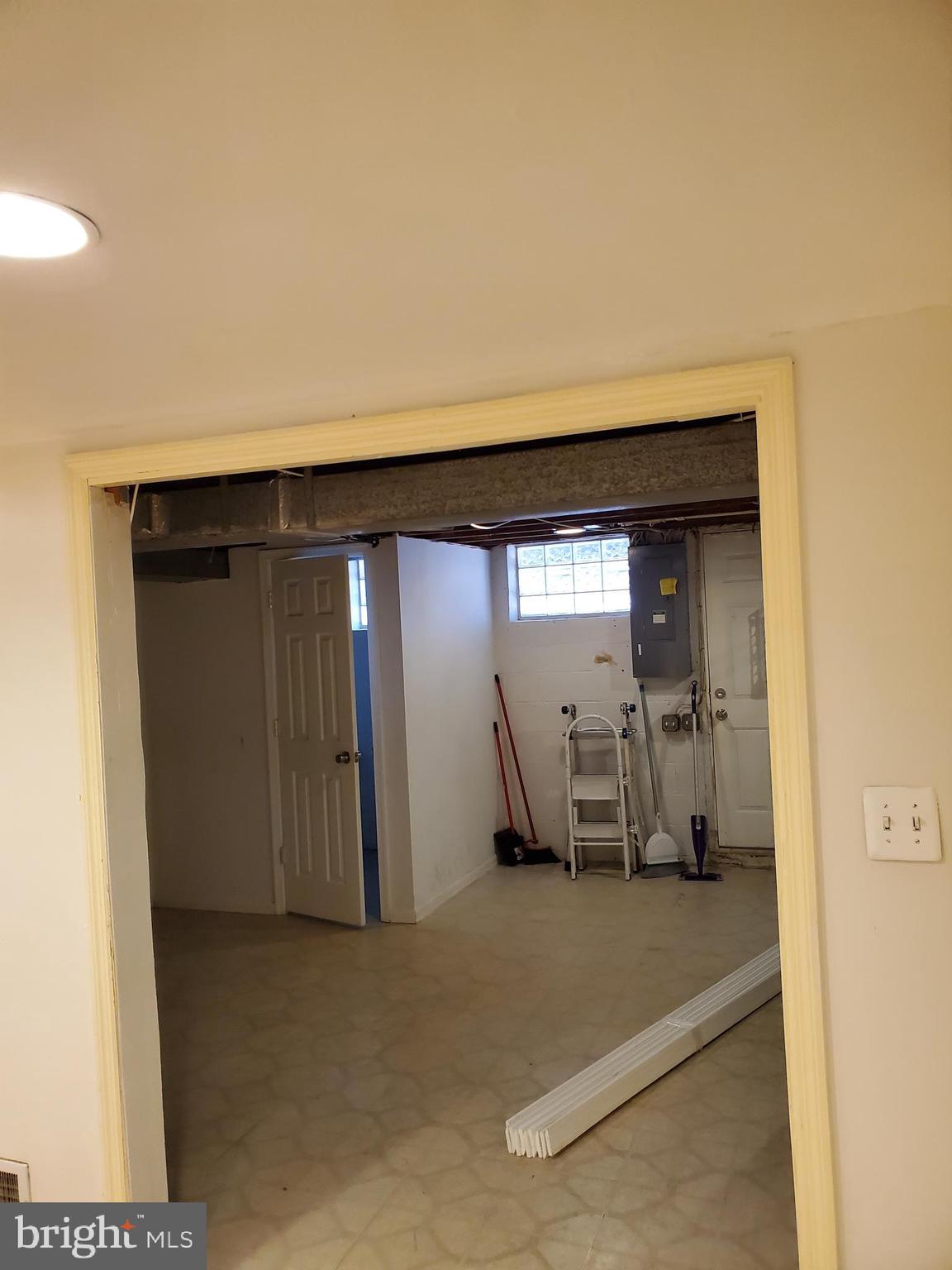 7859 Rockbourne Road Dundalk, MD 21222 - Photo 18 of 24 Lower level with toilet.