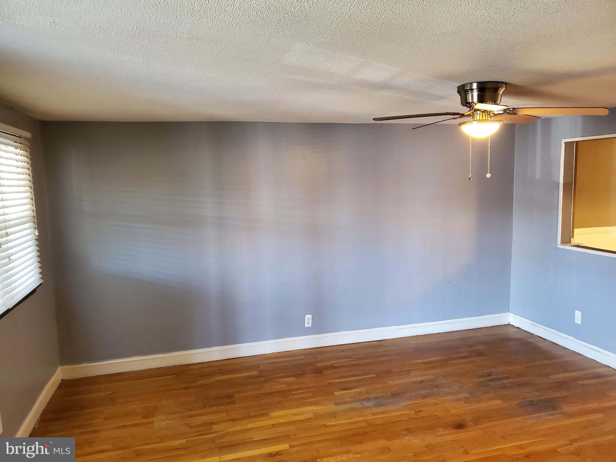 7859 Rockbourne Road Dundalk, MD 21222 - Photo 5 of 24 Living room.