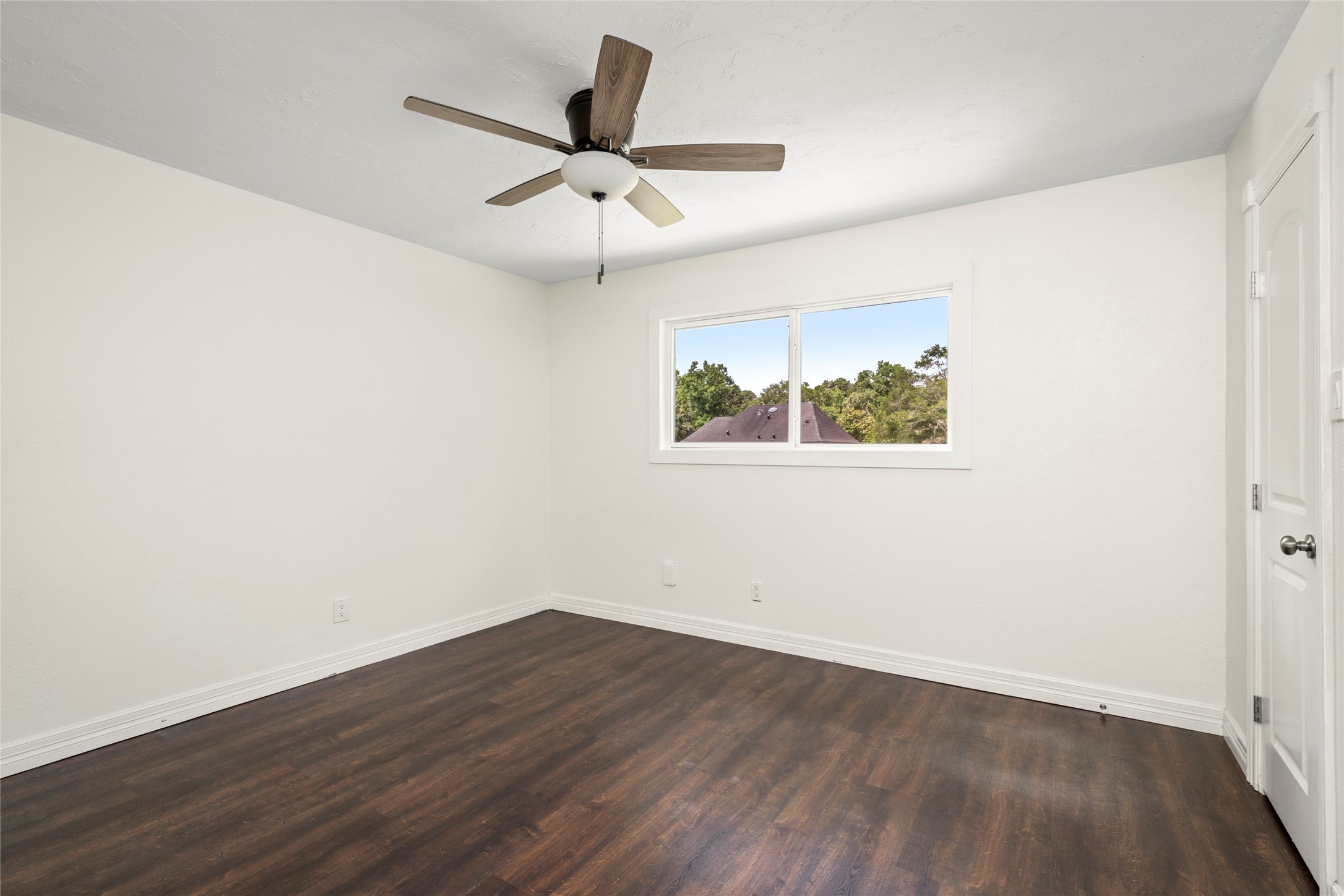 560 Landfall Lane Conroe, TX 77302 - Photo 35 of 41 Fourth bedroom overlooking the backyard.