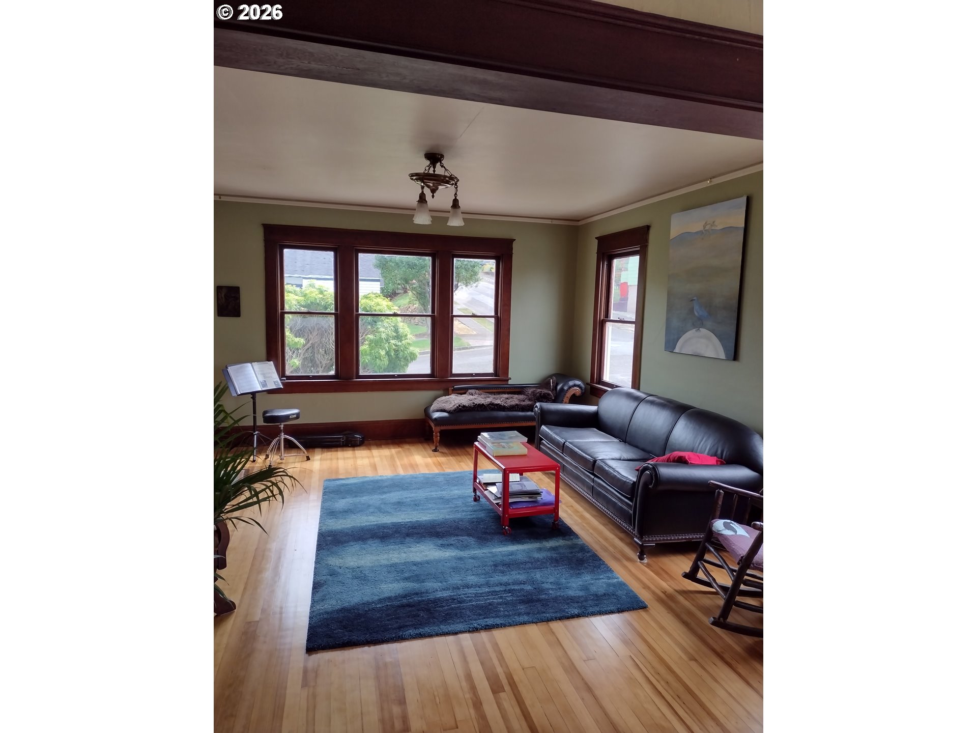 612 Harrison Avenue Astoria, OR 97103 - Photo 4 of 17 a living room with furniture and a wooden floor