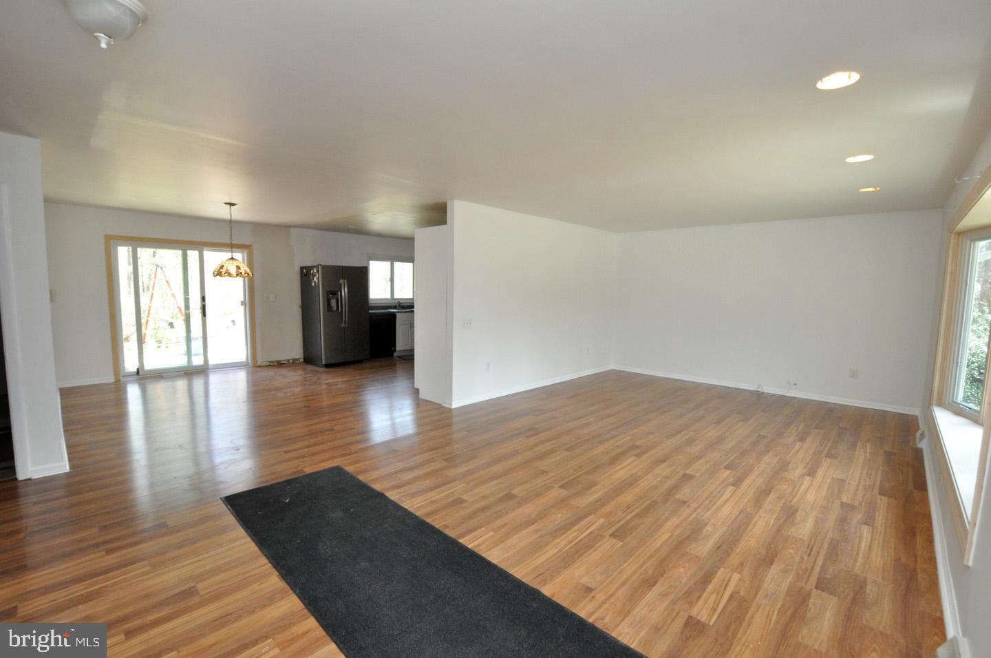 18 Wynn Road Tabernacle, NJ 08088 - Photo 3 of 27 wooden floor in an empty room with a window