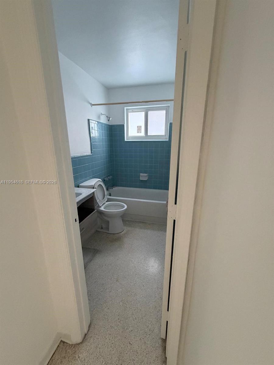 1608 Southwest 4th Street, Unit 9 Miami, FL 33135 - Photo 6 of 7 a bathroom with a toilet