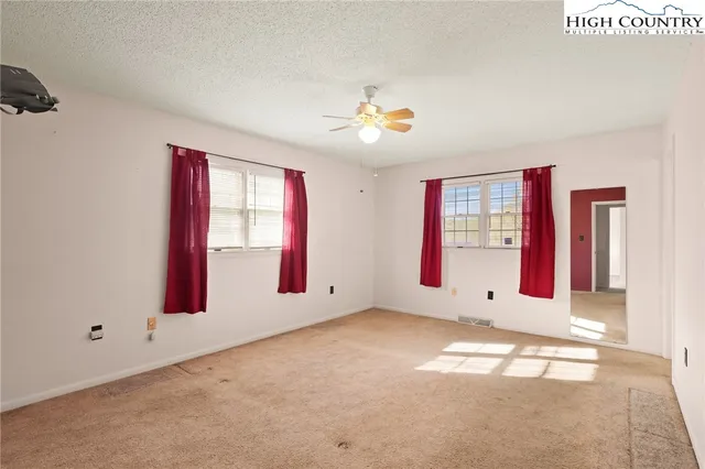 a view of an empty room with window