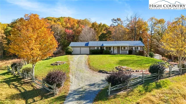 a view of swimming pool with a garden