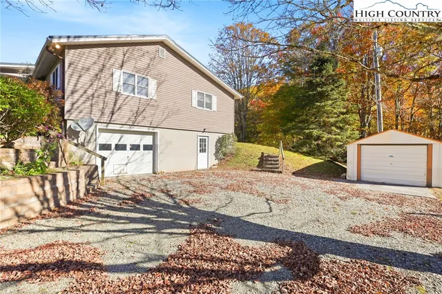 a view of a back yard of the house